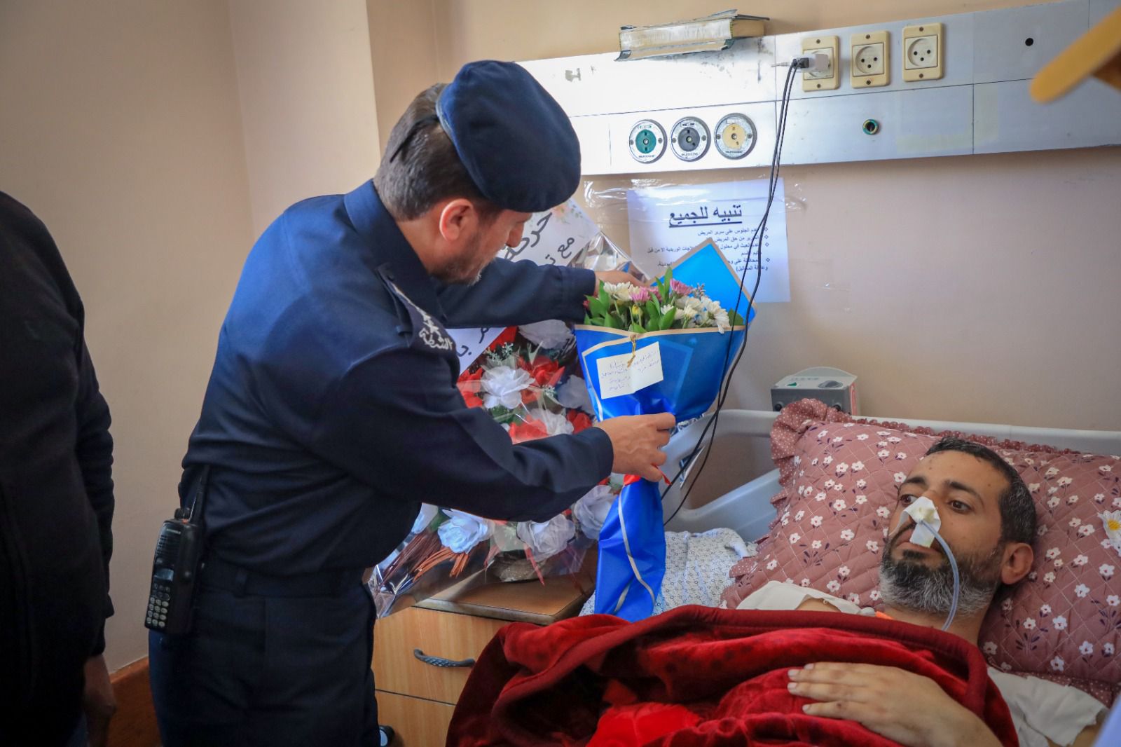 الشرطة المجتمعية تتفقد جرحى العدوان الإسرائيلي